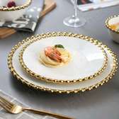 30pc nordic classic dinner set with gold rim.