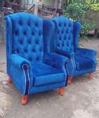 Single seaters tufted wingback arm chairs