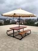 Outdoor bench and umbrella