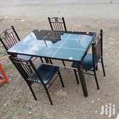 Black dining table with chairs