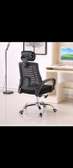 Black adjustable chair with a headrest