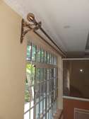Expert curtain rods and mosquito net installation