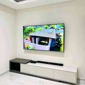 Sleek TV & Soundbar Entertainment Set