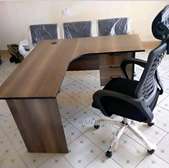 High back computer desk chair with an L shaped desk