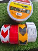 Self-adhesive reflective safety warning tape