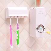 Toothpaste dispenser with Toothbrush Holder