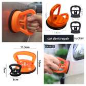 Car dent puller available in orange and black