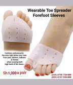 Wearable toe spreader