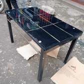 Black checked dining table with rubbered legs