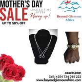 combo of double silver necklace and a wrist watch