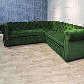Five seater green chesterfield L shaped sofa set