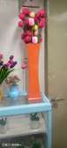 Artificial flower and vase