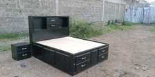 Bed with inbuilt drawers
