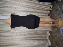 Off-shoulder black body cone mini dress