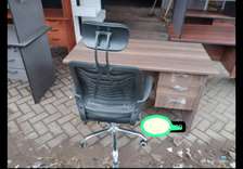 Black chair with a laptop table