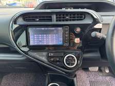 Make Toyota model Aqua white color fully loaded 2019 model.