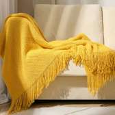 Knitted tassel throw blankets