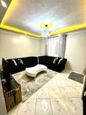 Stylish Black Corner Sofa Set with White Coffee Table