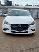 Mazda Axela white color Sedan 2019 model.