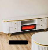 Elegant White TV Stand with Gold Trim & Fireplace