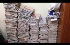 We buy old newspapers.