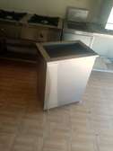 Mobile stainless steel dustbin with leg lifted lid