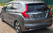 Honda fit non hybrid Silver color fully loaded 1300cc petrol