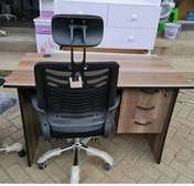 Work surface desk with an adjustable chair