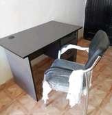 Beautiful grey office desk and leather chair