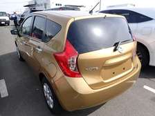 GOLD NISSAN NOTE  (KDJ)