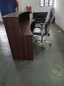 Reception desk with a leather chair