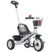 Kids tricycle with push handle