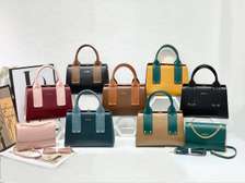 Elegant Handbags with Detachable Straps in Vibrant Colors