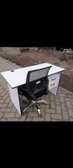 Space saving writing table with an office chair