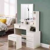 Dressing table with sliding mirror
