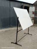 Rotational double sided whiteboards with a stand