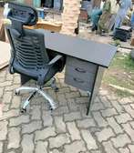 Headrest office chair with a desk