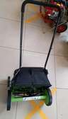 Manual lawn mower with collection bag