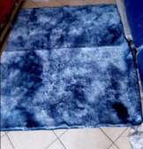 Blue patched fluffy carpet