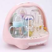 Baby bottle drying rack with a lid