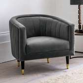 The grey velvet tub armchair