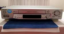Sony 6-Head Hi-Fi VHS Player & 16 Original VHS Tapes