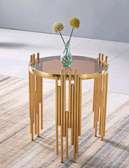 Circular modern coffee table with gold stands