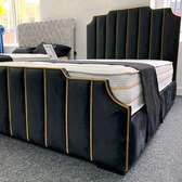 Tufted king sized Bed in black and gold