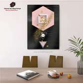 black and pink wall hanging