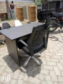 Adjustable office chair and a desk