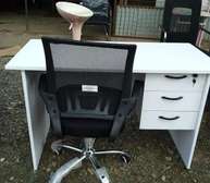 Executive office desk with a  swivel chair