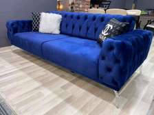 Round button tufted blue raised 3 seater