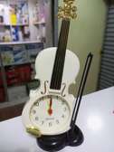 Battery powered violin alarm clock