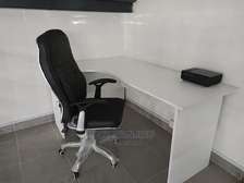 Leather office chair and a desk